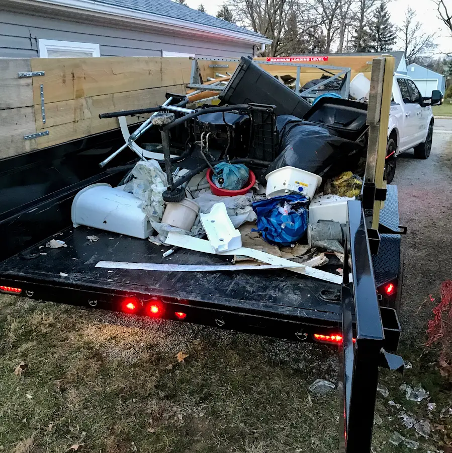 Roll-off dumpster delivered to a residential driveway in Bucksport